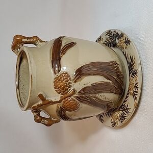Artisan hand painted, glazed ceramic pot and plate.  Beautiful, warm details.
